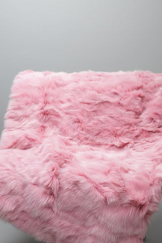 pink sectioned fox fur throw