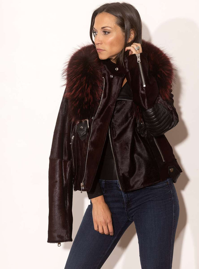 burgundy cowhide leather moto jacket with raccoon fur collar