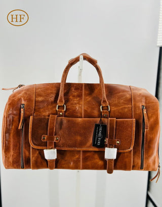 Leather Duffle Bag with Detachable Leather Shoulder Strap.