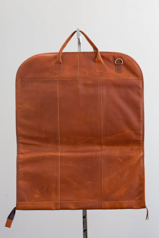 tan leather garment bag