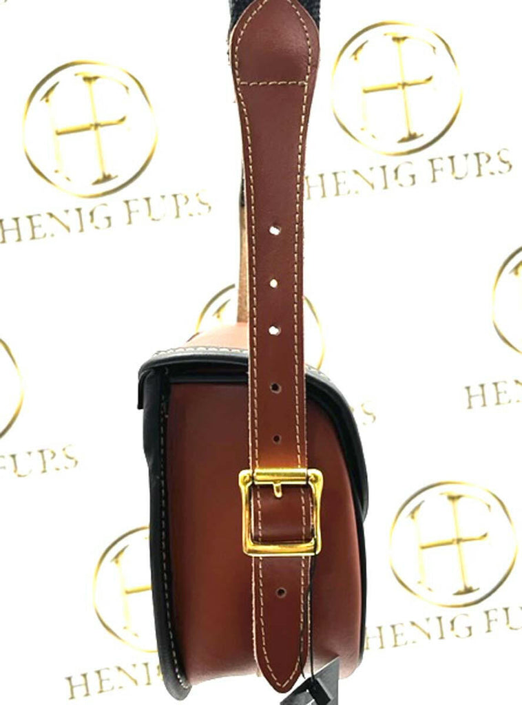 side detail of cognac leather shell carrying case