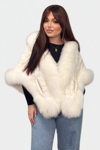white sheared sectioned mink fur cape with fox fur trim