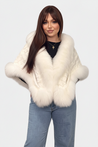 white sheared sectioned mink fur cape with fox fur trim