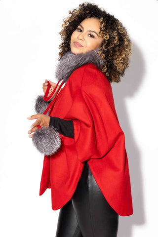 red wool blend cape with indigo fox fur trim