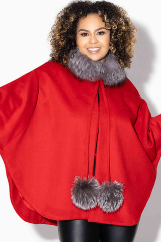 red wool blend cape with indigo fox fur trim