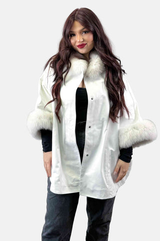 white leather capelet with blue fox fur trim