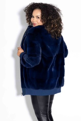 back of navy nafa mink fur jacket against a white backdrop
