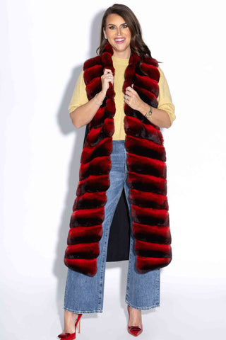 smiling woman wearing a Long Red Chinchilla Fur and Italian Cashmere & Wool Blend Vest against a white backdrop