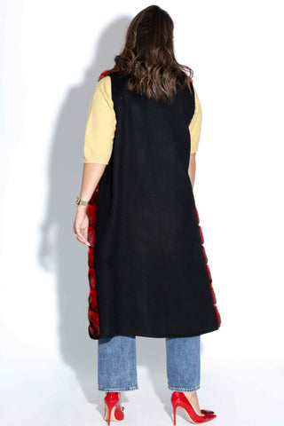back of woman wearing a Long Red Chinchilla Fur and Italian Cashmere & Wool Blend Vest against a white backdrop