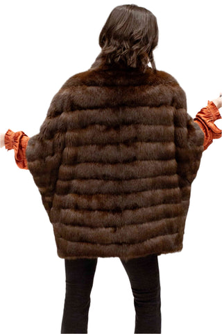 sable fur cape with horizontal pattern and cropped sleeves