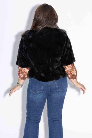 back of woman wearing a Sectioned Mink Fur Jacket with Russian Sable Fur Front against a white backdrop