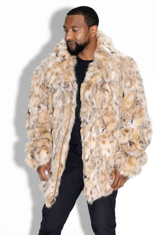 man wearing a sectioned bobcat fur bomber jacket