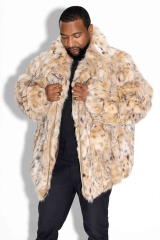 man wearing a sectioned bobcat fur jacket, adjusting the front of the jacket, against a white backdrop