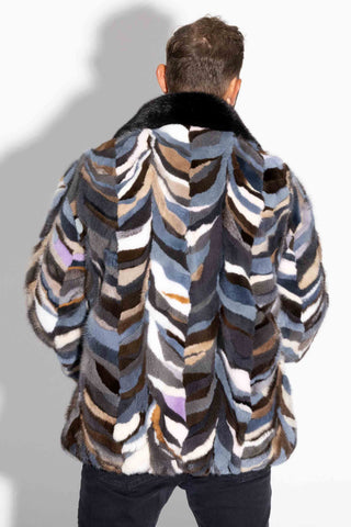 back of men's multicolor sectioned mink fur bomber with mink fur collar against a white backdrop