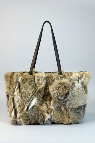 sectioned bobcat fur purse with matching fur key chain