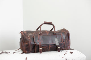 Leather Duffle Bag with Detachable Leather Shoulder Strap.
