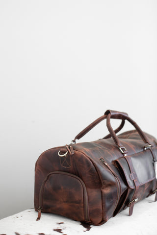 Leather Duffle Bag with Detachable Leather Shoulder Strap.