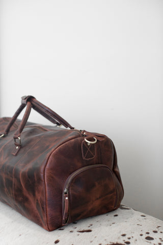 Leather Duffle Bag with Detachable Leather Shoulder Strap.