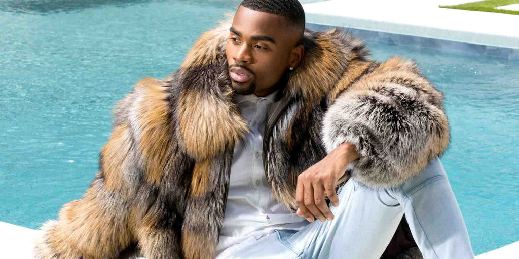 Man wearing a fox fur jacket by the pool - Check out our Fur Buying Guide!