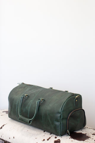Leather Duffle Bag with Detachable Leather Shoulder Strap.