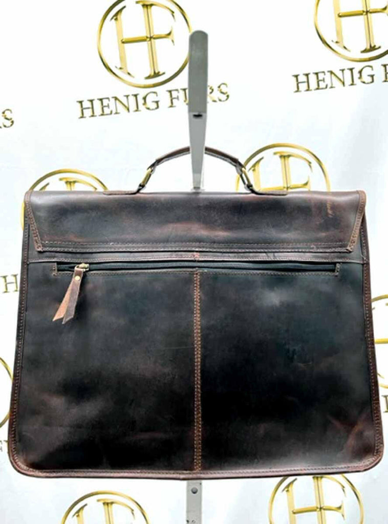 back of dark brown leather briefcase with detachable shoulder strap